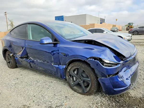 7SAYGDED0TF411540 — 2026 Tesla Model Y, фото 4 с аукциона Copart 14.10.2026, Боковая часть