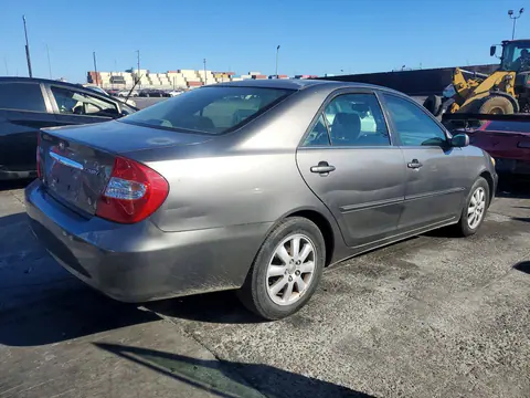 2002 Toyota Camry VIN JTDBE32K820125194 фото 3