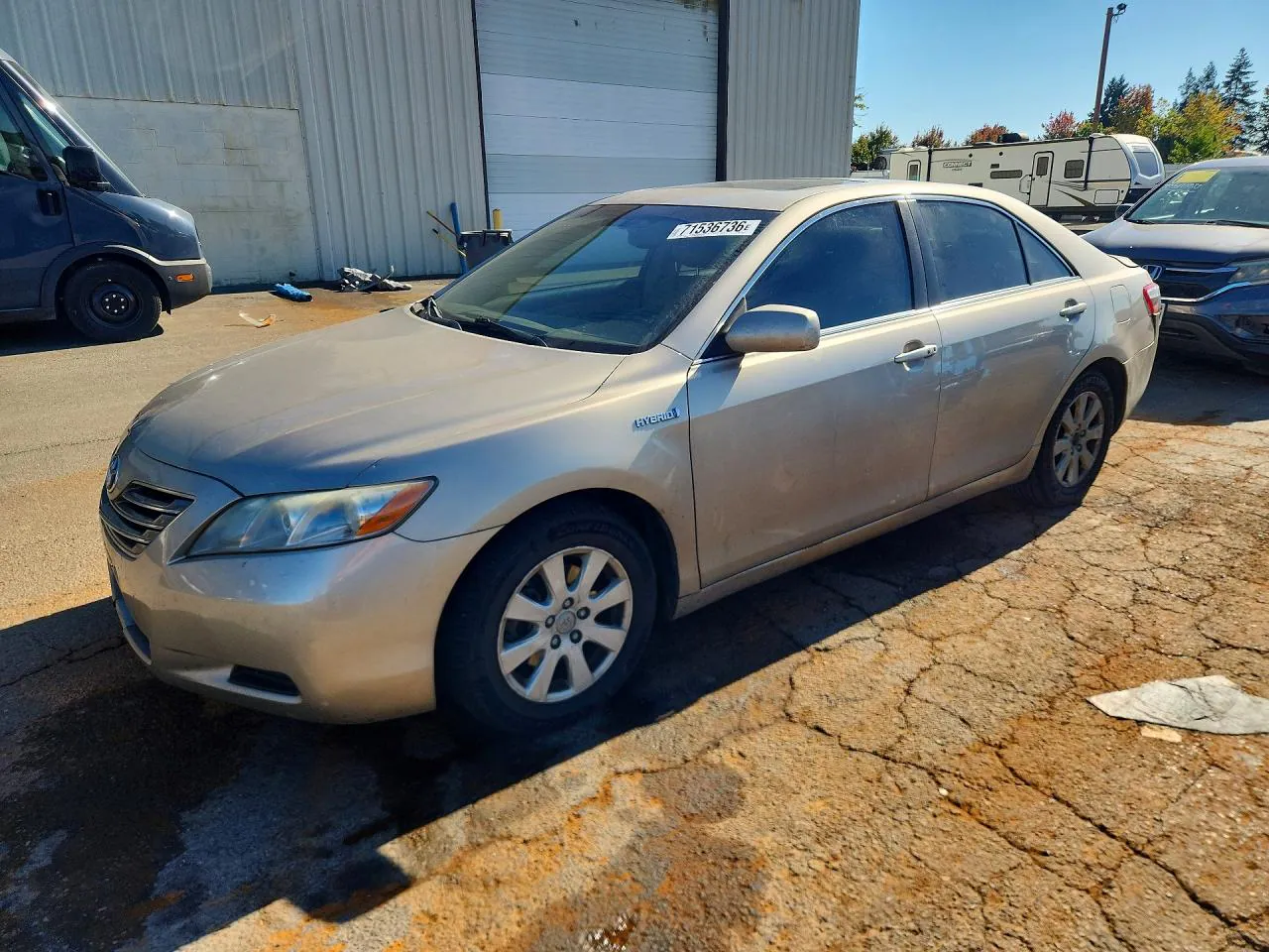 2009 Toyota Camry Hybrid VIN JTNBB46K493052404 фото 1