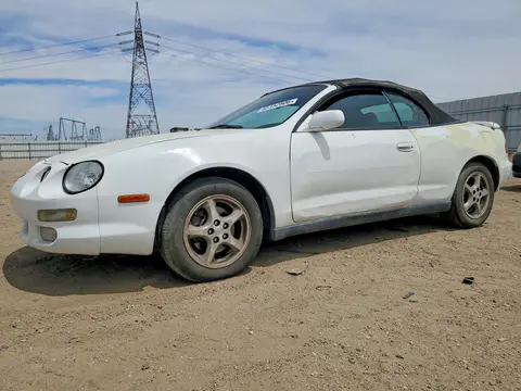 JT5FG02T1W0049936 — 1998 Toyota Celica, Боковая часть (Side), фото до ремонта