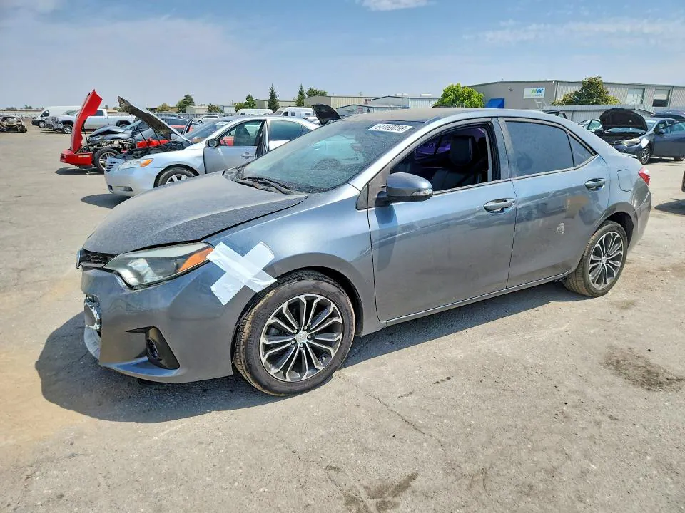2014 Toyota Corolla VIN 5YFBURHE3EP110944 фото 1