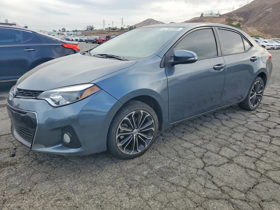 2014 Toyota Corolla VIN 5YFBURHE5EP067286 фото 1
