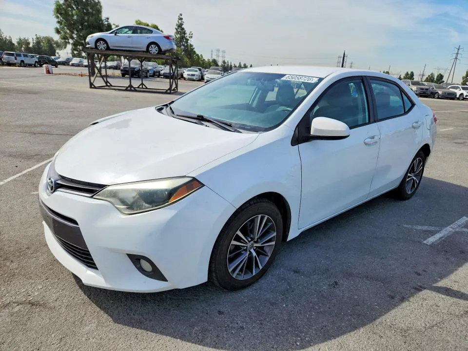 2016 Toyota Corolla VIN 5YFBURHE5GP366201 фото 1