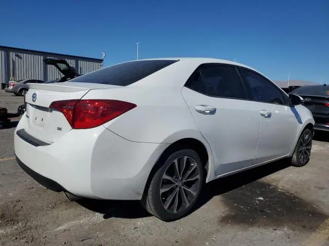 2017 Toyota Corolla VIN 5YFBURHE0HP734379 фото 3