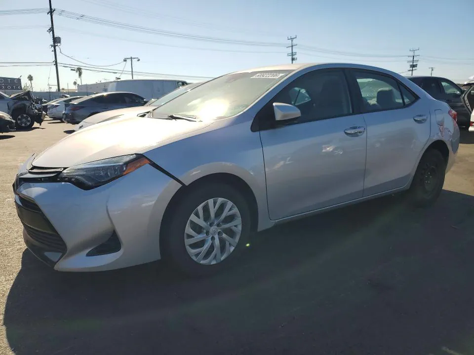 2017 Toyota Corolla VIN 5YFBURHE7HP677324 фото 1