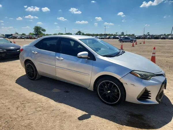 5YFBURHEXHP646990 — 2017 Toyota Corolla, фото 4 с аукциона Copart, Боковая часть