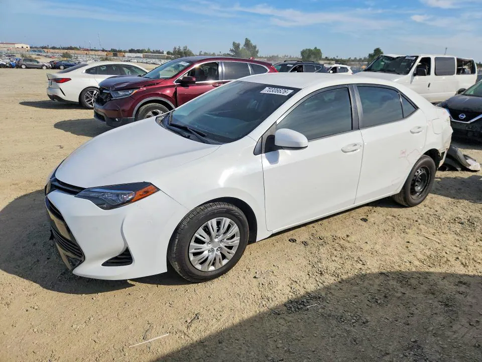 2018 Toyota Corolla VIN 5YFBURHEXJP770733 фото 1