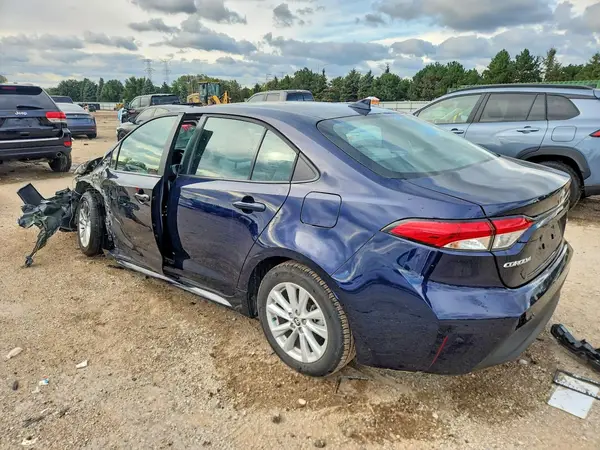 5YFB4MDE8SP357137 — 2025 Toyota Corolla, фото 2 с аукциона Copart, Боковая часть