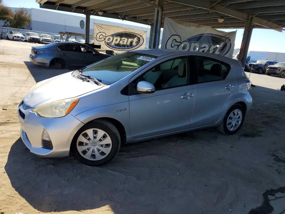 2014 Toyota PRIUS C VIN JTDKDTB32E1559461 фото 1