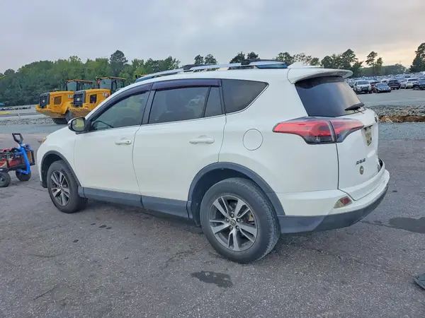 JTMWFREV8GJ076765 — 2016 Toyota RAV4, фото 2 с аукциона Copart 29.09.2026, Задняя часть