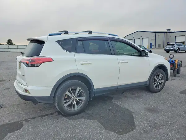 JTMWFREV8GJ076765 — 2016 Toyota RAV4, фото 3 с аукциона Copart 29.09.2026, Задняя часть