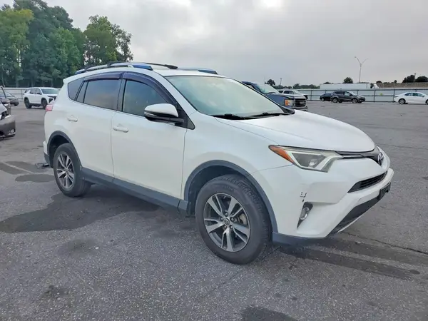 JTMWFREV8GJ076765 — 2016 Toyota RAV4, фото 4 с аукциона Copart 29.09.2026, Задняя часть