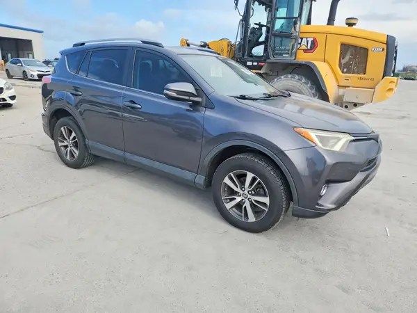 JTMWFREV3HJ130541 — 2017 Toyota RAV4, фото 4 с аукциона Copart 30.09.2026, Боковая часть
