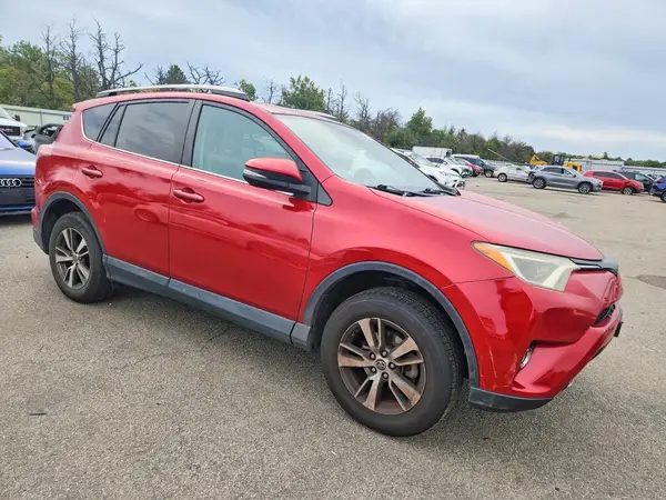2T3RFREV4HW571724 — 2017 Toyota RAV4, фото 4 с аукциона Copart 30.09.2026, Боковая часть