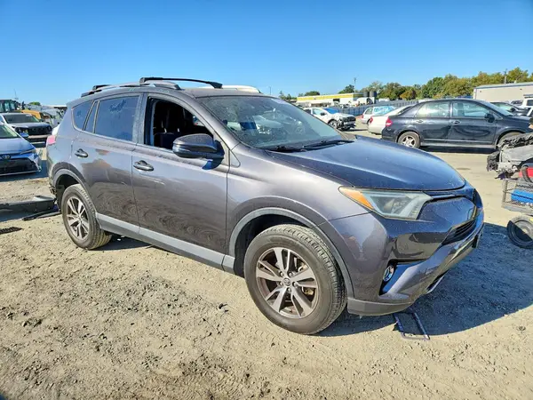 JTMWFREV1JJ209468 — 2018 Toyota RAV4, фото 4 с аукциона Copart 29.09.2026, Задняя часть