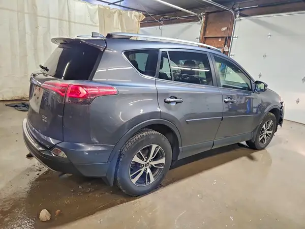 JTMRFREV5JJ724504 — 2018 Toyota RAV4, фото 3 с аукциона Copart 01.10.2026, Боковая часть