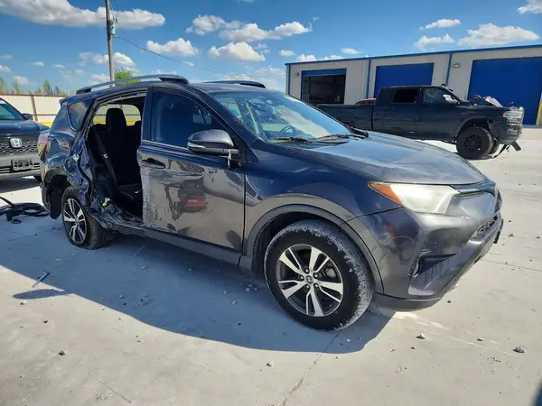 JTMWFREV1JJ171630 — 2018 Toyota RAV4, фото 4 с аукциона Copart, Боковая часть