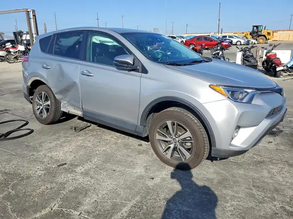2T3WFREV3JW513614 — 2018 Toyota RAV4, фото 4 с аукциона Copart, Боковая часть