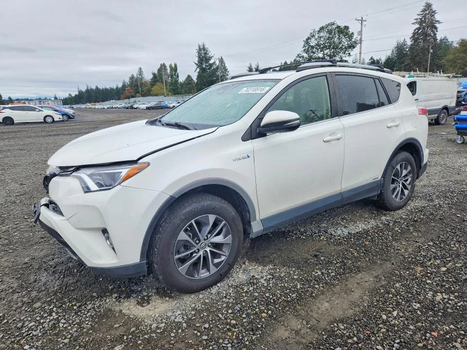 2018 Toyota RAV4 HYBRID VIN JTMRJREV7JD212983 фото 1