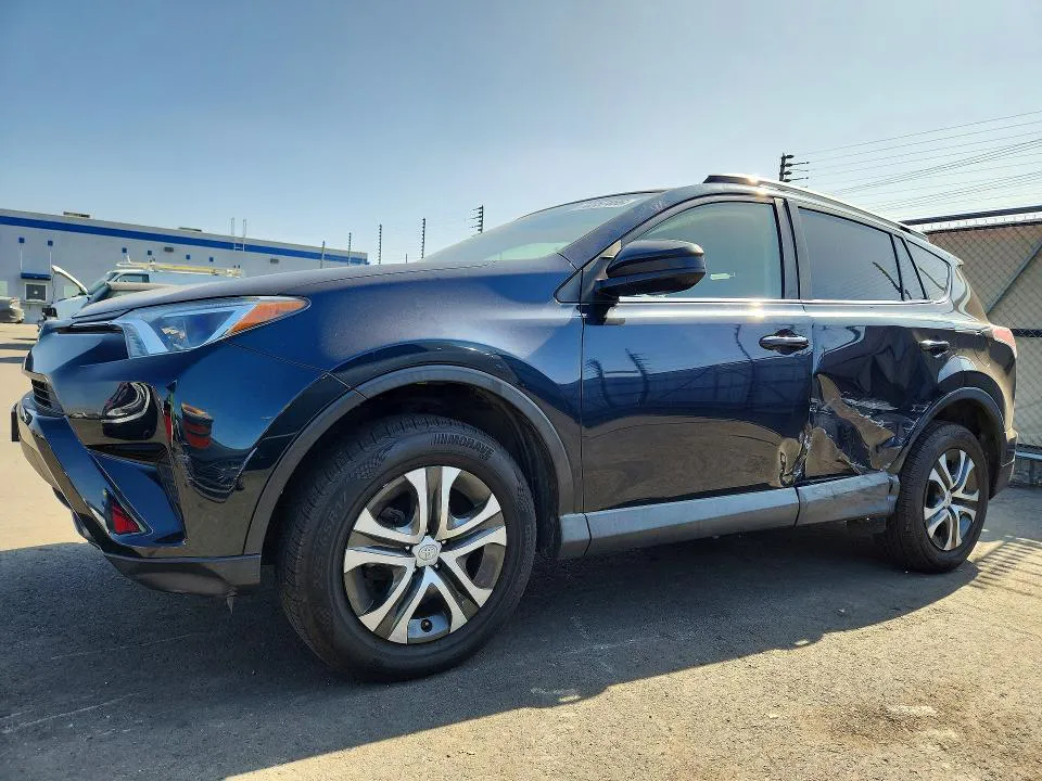 2018 Toyota RAV4 VIN JTMZFREV0JJ176086 фото 1
