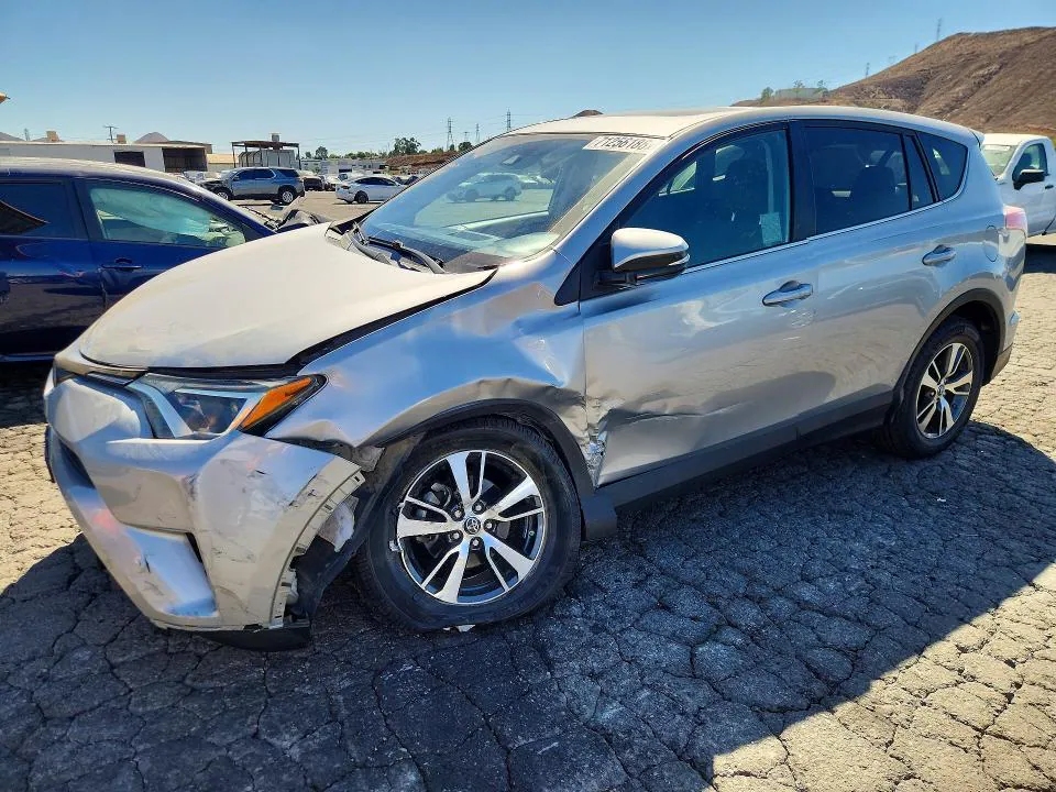 2018 Toyota RAV4 VIN 2T3WFREV2JW519548 фото 1