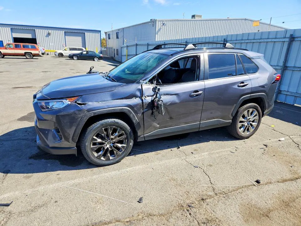 2019 Toyota RAV4 VIN JTMA1RFVXKD008952 фото 1