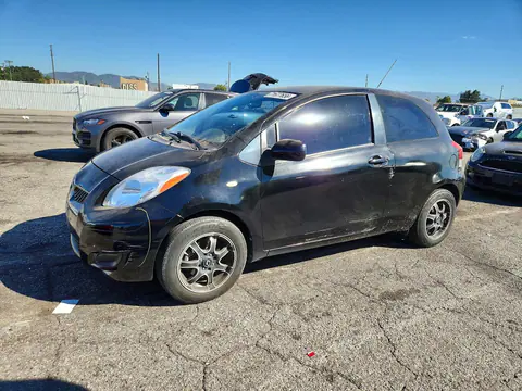 2009 Toyota Yaris Base VIN JTDJT903695276113 фото 1