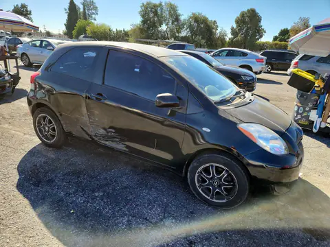 2009 Toyota Yaris Base VIN JTDJT903695276113 фото 4
