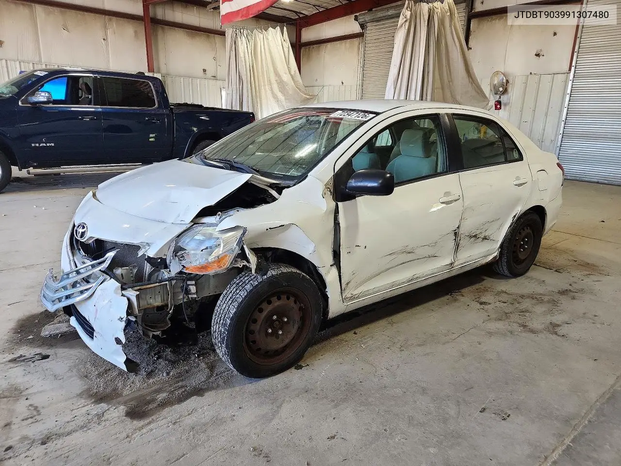 2009 Toyota Yaris Base VIN JTDBT903991307480 фото 1