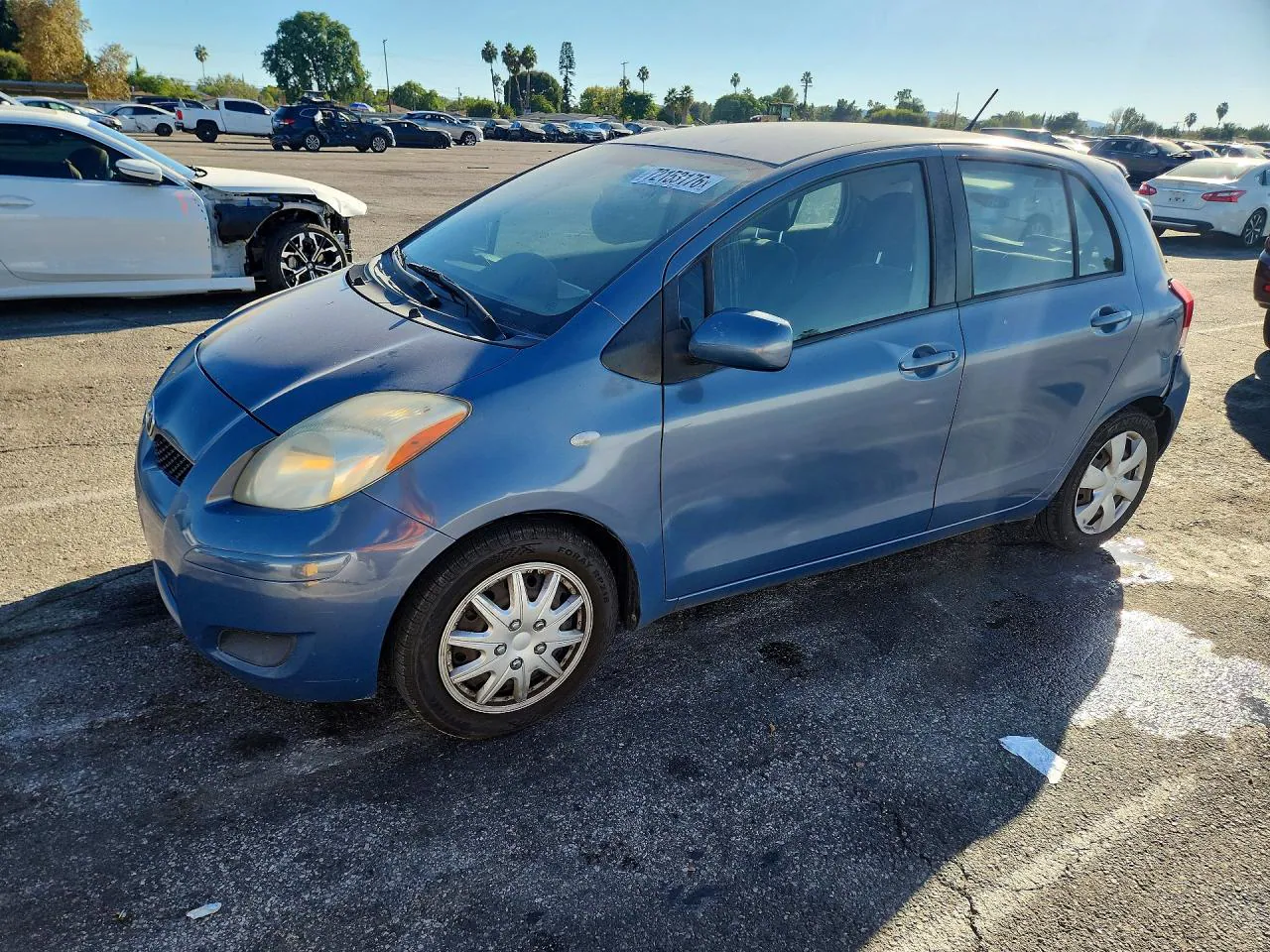 2010 Toyota Yaris Base VIN JTDKT4K38A5306849 фото 1