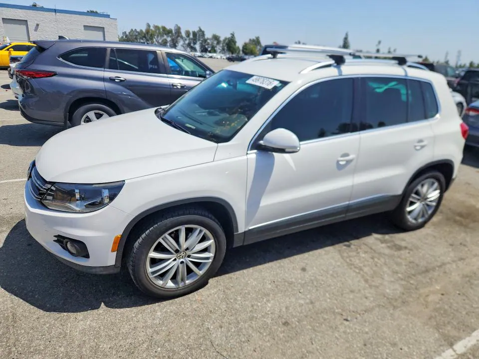 2014 Volkswagen Tiguan VIN WVGAV3AX4EW550496 фото 1