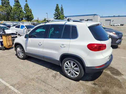 2014 Volkswagen Tiguan VIN WVGAV3AX4EW550496 фото 2
