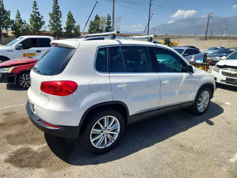 2014 Volkswagen Tiguan VIN WVGAV3AX4EW550496 фото 3