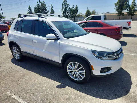 2014 Volkswagen Tiguan VIN WVGAV3AX4EW550496 фото 4