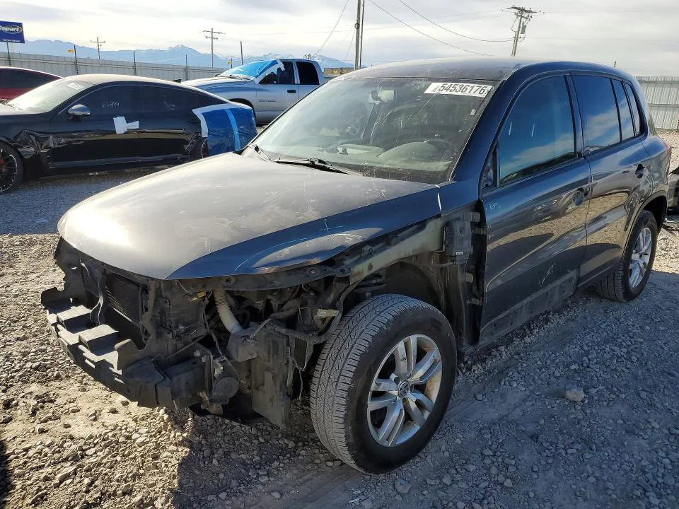 2014 Volkswagen Tiguan VIN WVGBV3AX7EW580385 фото 1