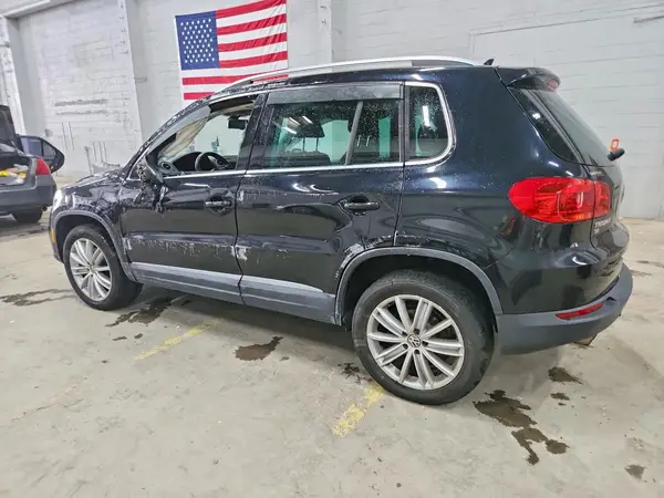 WVGAV7AX9GW528309 — 2016 Volkswagen Tiguan, фото 2 с аукциона Copart, Боковая часть