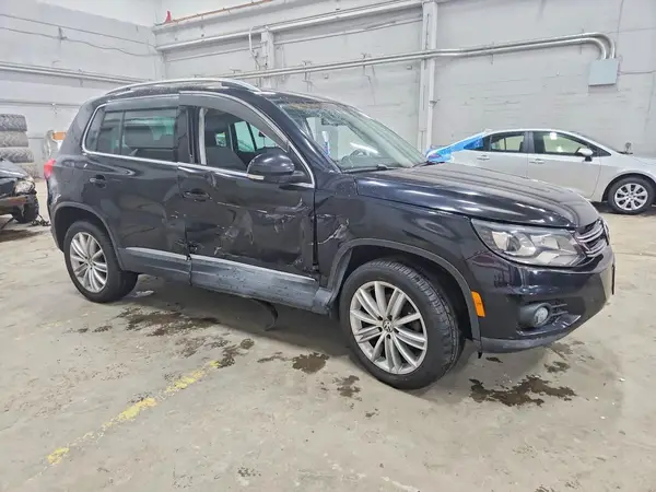 WVGAV7AX9GW528309 — 2016 Volkswagen Tiguan, фото 4 с аукциона Copart, Боковая часть