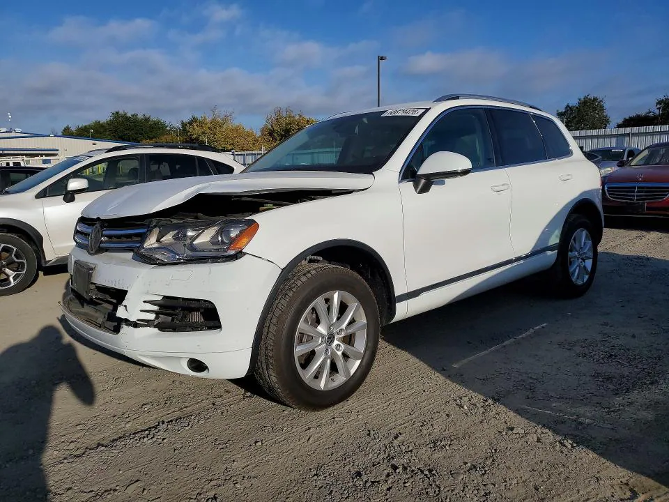 2014 Volkswagen Touareg VIN WVGEP9BP1ED007101 фото 1