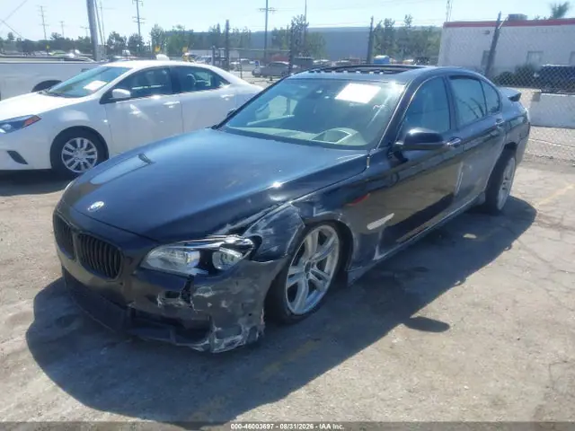 2015 BMW 740I VIN WBAYA6C56FD827056 фото 2