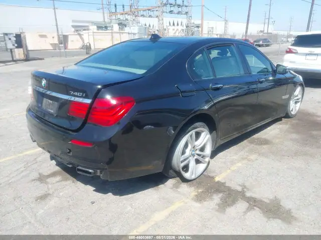 2015 BMW 740I VIN WBAYA6C56FD827056 фото 4