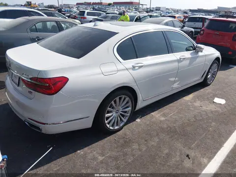 2016 BMW 740I VIN WBA7E2C59GG547351 фото 4
