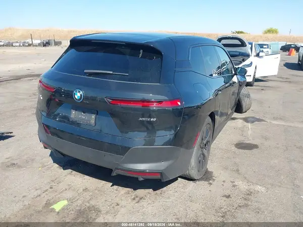 WB523CF03SCU38873 — 2025 BMW iX, фото 4 с аукциона IAAI, Передняя часть справа