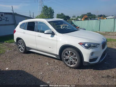 WBXHT3C35J5L26059 — 2018 BMW X1 XDRIVE28I, Подтопление (Water), фото до ремонта