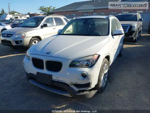 2014 BMW X1 VIN WBAVL1C58EVY12972 фото 2
