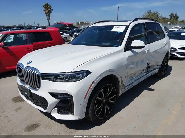 5UXCW2C01M9E99106 — 2021 BMW X7, фото 2 с аукциона IAAI, Левый бок