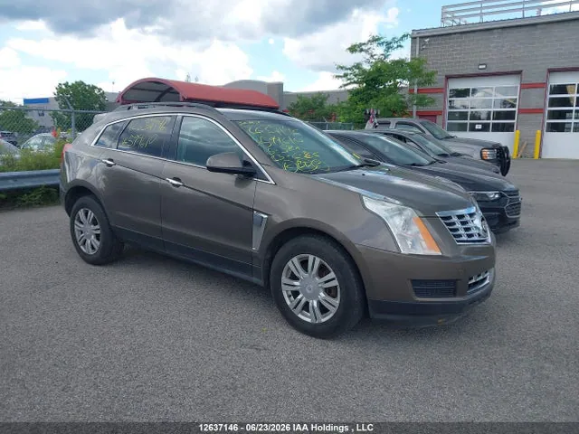 2015 Cadillac SRX VIN 3GYFNAE32FS594610 фото 1