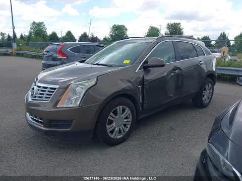 2015 Cadillac SRX VIN 3GYFNAE32FS594610 фото 2