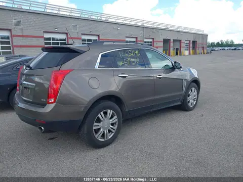 2015 Cadillac SRX VIN 3GYFNAE32FS594610 фото 4