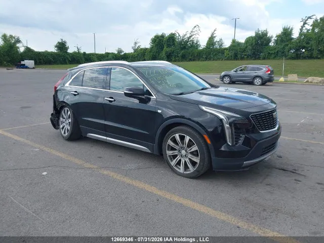 2019 Cadillac XT4 VIN 1GYFZDR48KF186183 фото 1