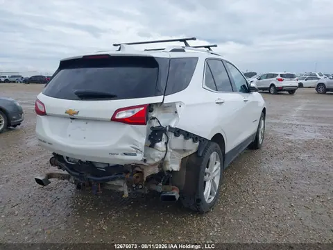 2018 Chevrolet Equinox Premier VIN 2GNAXWEX1J6265521 фото 4